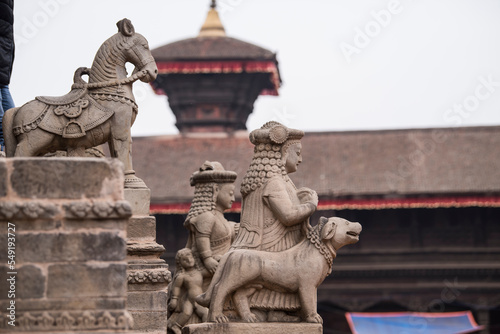 Kathmandu, Nepal- April 20,2022 : Patan Durbar Square is situated at the centre of Lalitpur city. Patan is one of the oldest know Buddhist City. It is a center of both Hinduism and Buddhism. photo