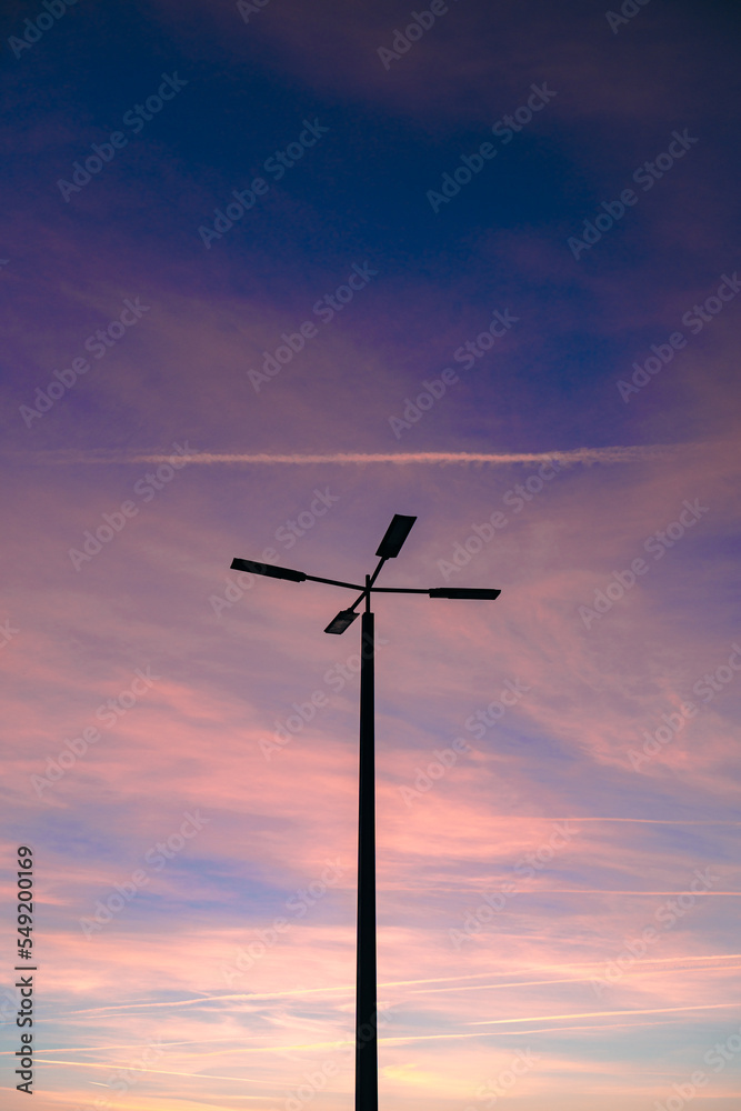 Obraz premium wind turbine at sunset
