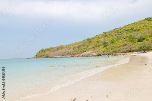 Beautiful tropical Thailand island panoramic with beach, white sea, mountain and coconut palms for holiday vacation background concept. Suitable for relaxing in summer when traveling together family.