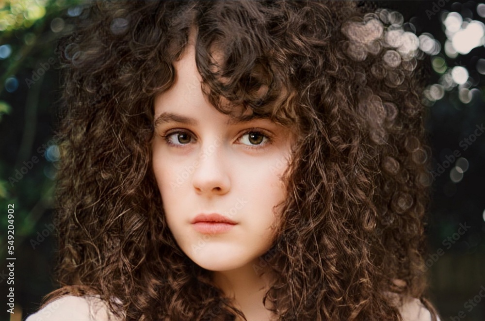 Close-up of a curly-haired girl's face