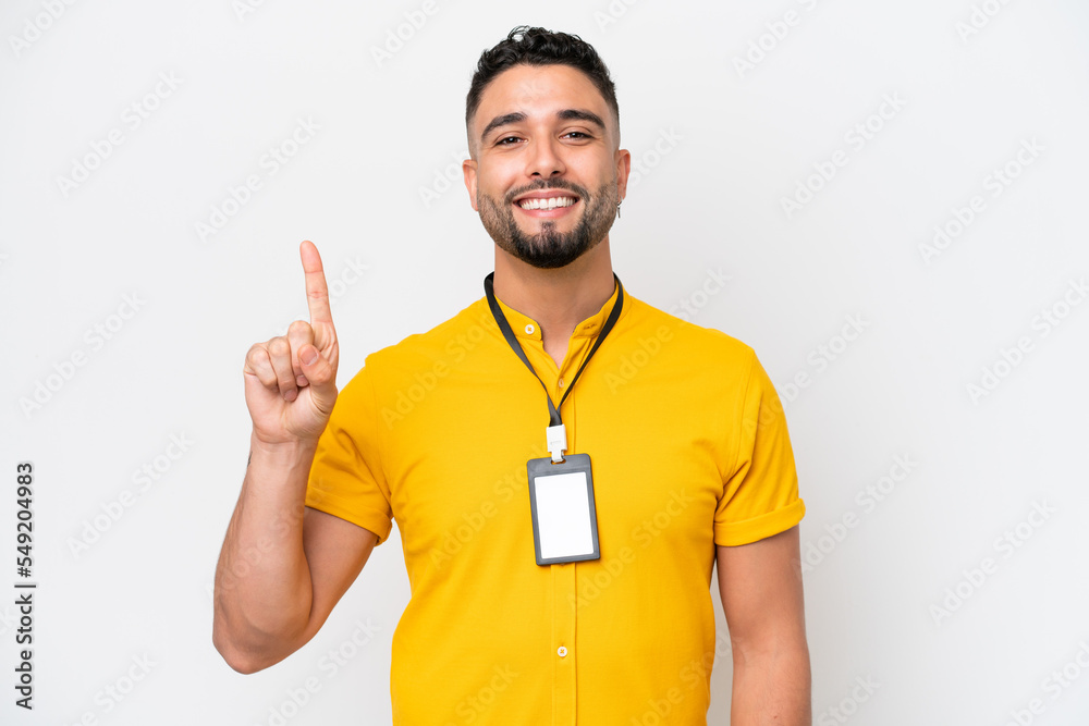 Young Arab man with ID card isolated on white background pointing up a great idea Young Arab man with ID card isolated on white background pointing up a great idea