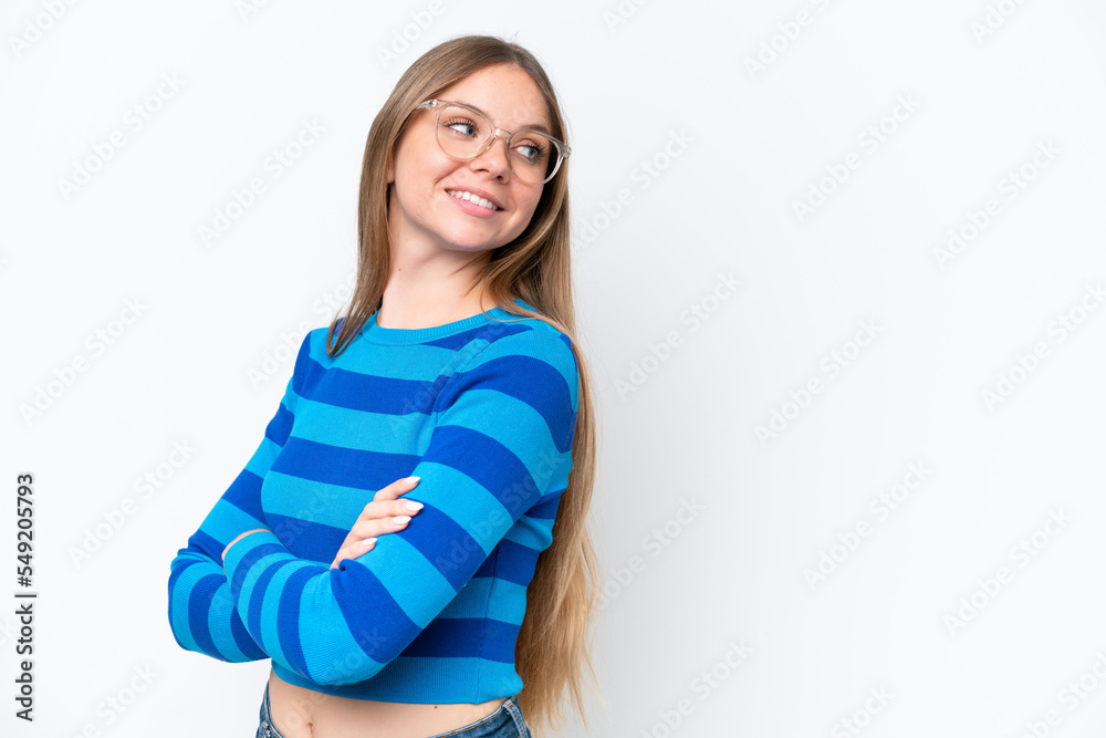 Young beautiful blonde woman isolated on white background with arms crossed and happy Young beautiful blonde woman isolated on white background with arms crossed and happy