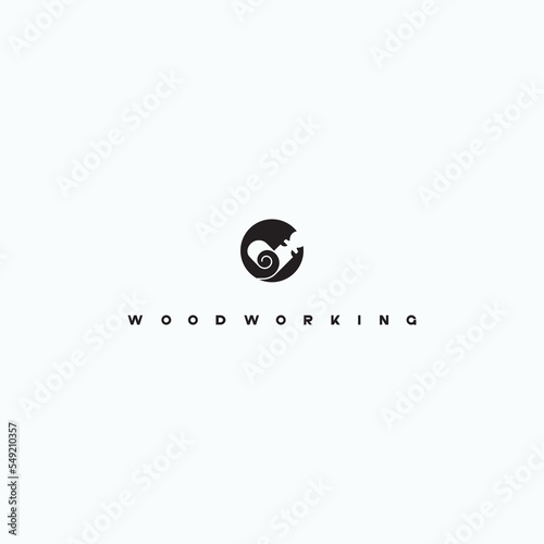 
an illustration consisting of an image of a chisel plowing a tree and the inscription "woodworking"