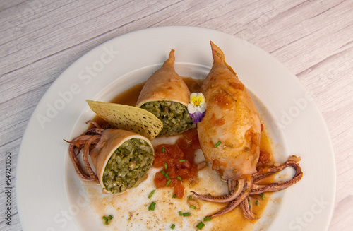 RECIPE FOR STUFFED SQUID, RIZOTTO AND SPINACH PESTO, HOMEMADE TOMATO SAUCE, High quality photo photo