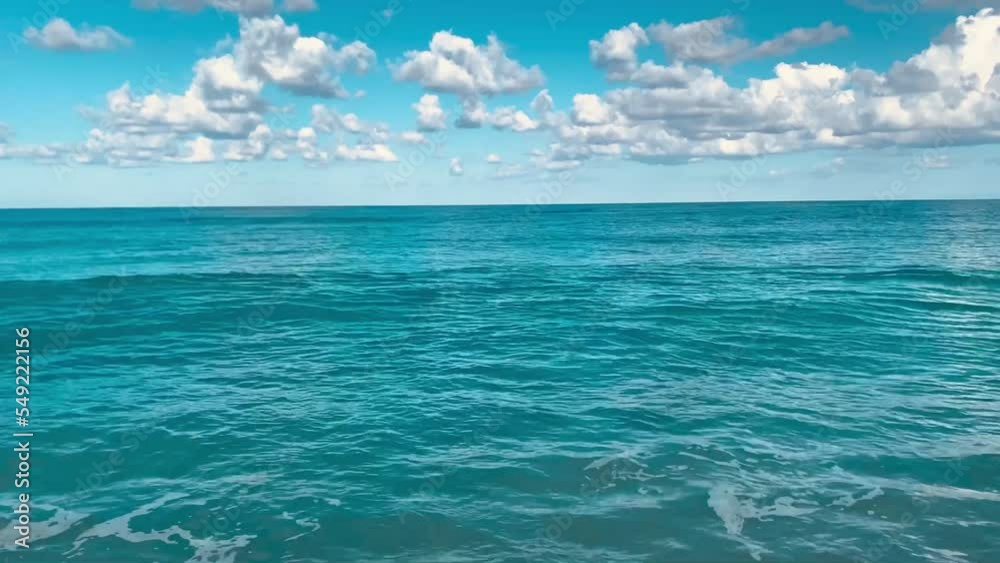 Sea expanse landscape. Beautiful blue sea and large calm waves float on the Mediterranean sea. Sea and sky with clouds background landscape. Sea expanse landscape. Beautiful blue sea and large calm waves float on the Mediterranean sea. Sea and sky with clouds background landscape.