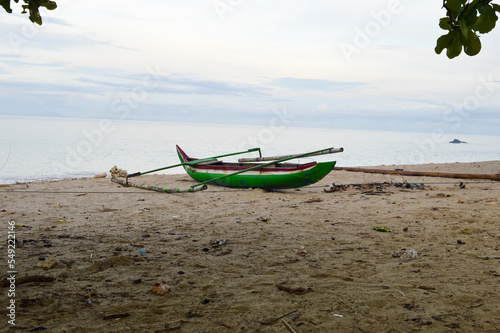 Fototapeta Naklejka Na Ścianę i Meble -  Daplangu Sumur Beach, Pandeglang, Indonesia – October 09, 2022: The Best Spots To Enjoy The Beach Atmosphere. With Selected Focus.