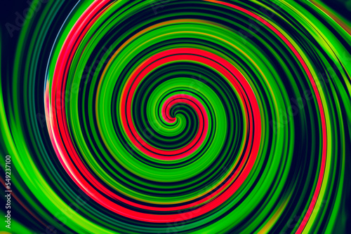Green Abstract color background with lines in spiral
