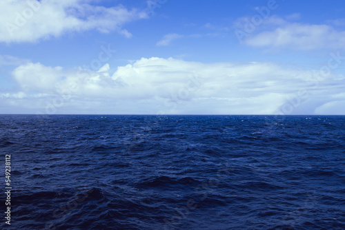 The blue sky and ocean meet in the Drake Passage. photo