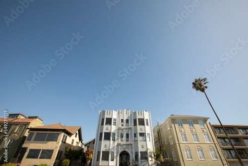 Afternoon view of dense housing buildings in downtown Oakland, California, USA.