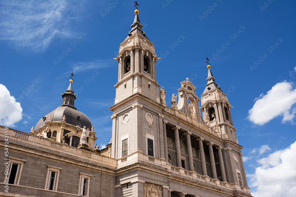 Bell tower and dome of the cathedral Santa Maria la Real de la Almudena in Madrid