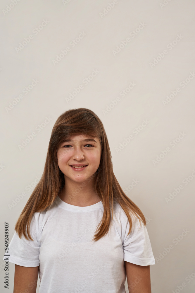 Cute smiling caucasian teenage girl look at camera Cute smiling caucasian teenage girl look at camera