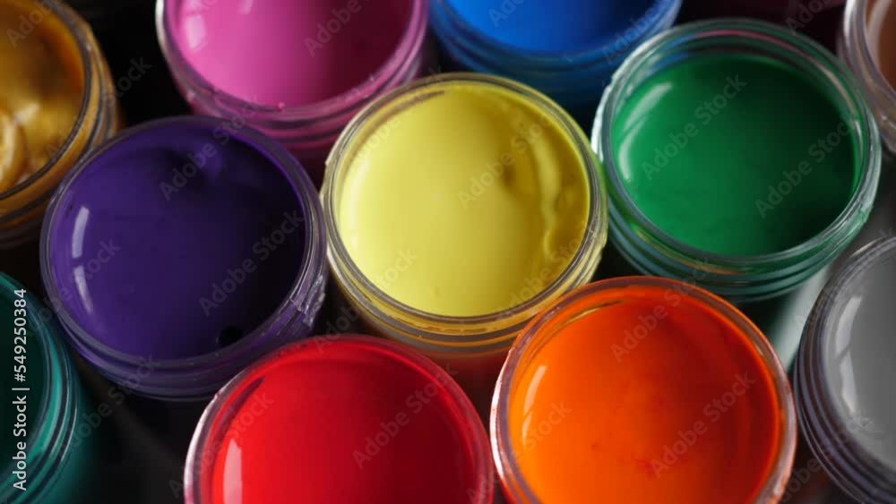 Set Gouache Paints in Jars Bright Color Close Up. Rotation Set of Multicolor Gouache on Plastic Jars. Rotation Multicolor Background. Background of Multi Colored Paint. Creative Drawing Art Hobby. Set Gouache Paints in Jars Bright Color Close Up. Rotation Set of Multicolor Gouache on Plastic Jars. Rotation Multicolor Background. Background of Multi Colored Paint. Creative Drawing Art Hobby.
