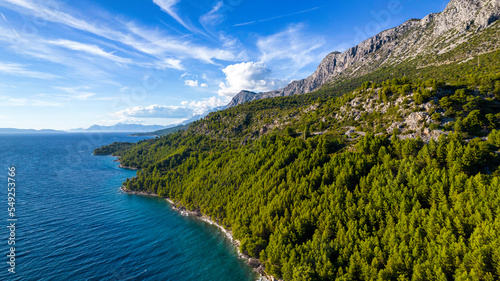 Croatia. Aerial view on beach and people. Vacation and relax. Beach and blue water. Top view from drone at beach and azure sea. Travel and holiday