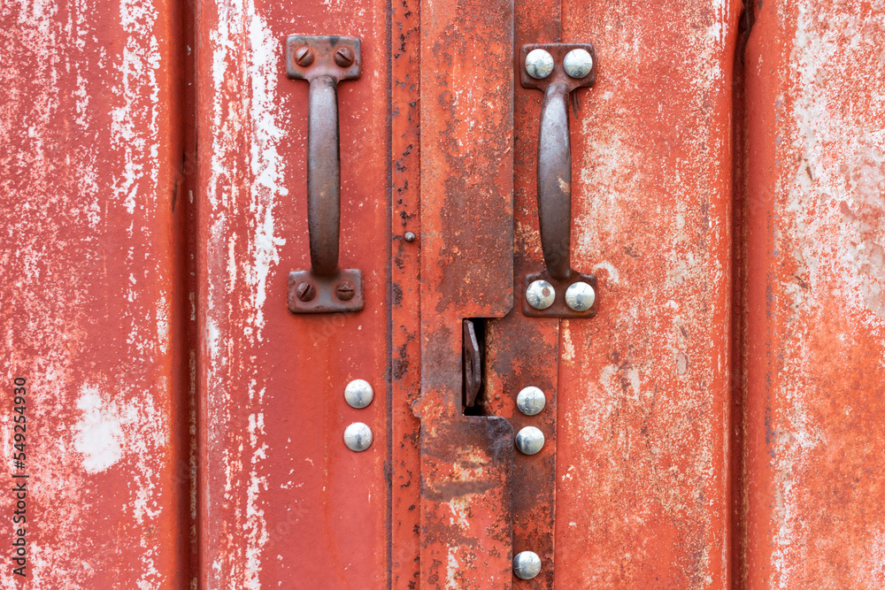 Weathered barn doors to a metal building Weathered barn doors to a metal building