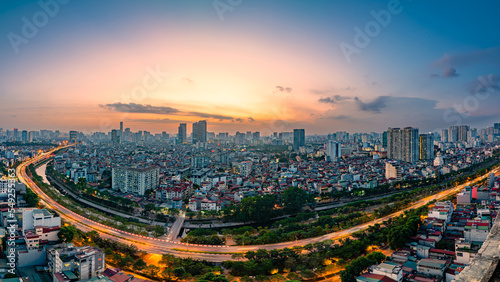 Long road along the city in beautiful sunset. Hanoi skyline. Cityscape Hanoi