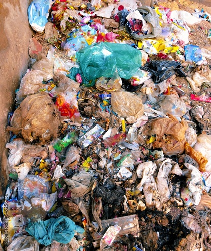 Garbage heap waste garbage-pile trash rubbish dump litter dirty solid-rubbish scrap refuse plasticbags waste-material debris household-waste environmental pollution recyclable landfill closeup photo  photo