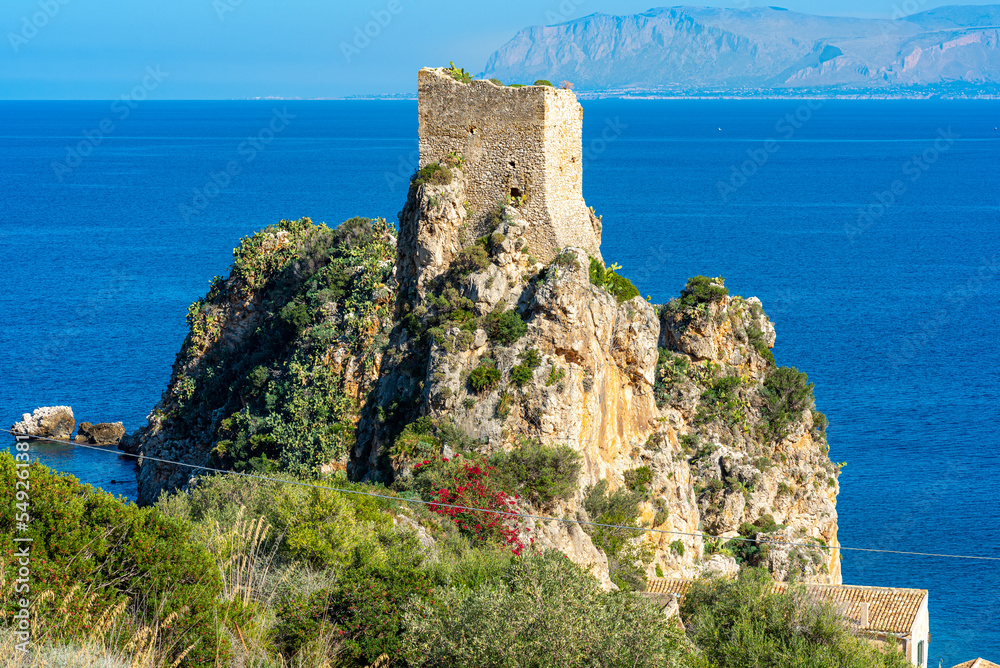 The watch tower Torre della Tonnara at the north coast of Sicily is part of the Tonnara of Scopello, the famous and former tuna factory and fishing station of the village of Scopello