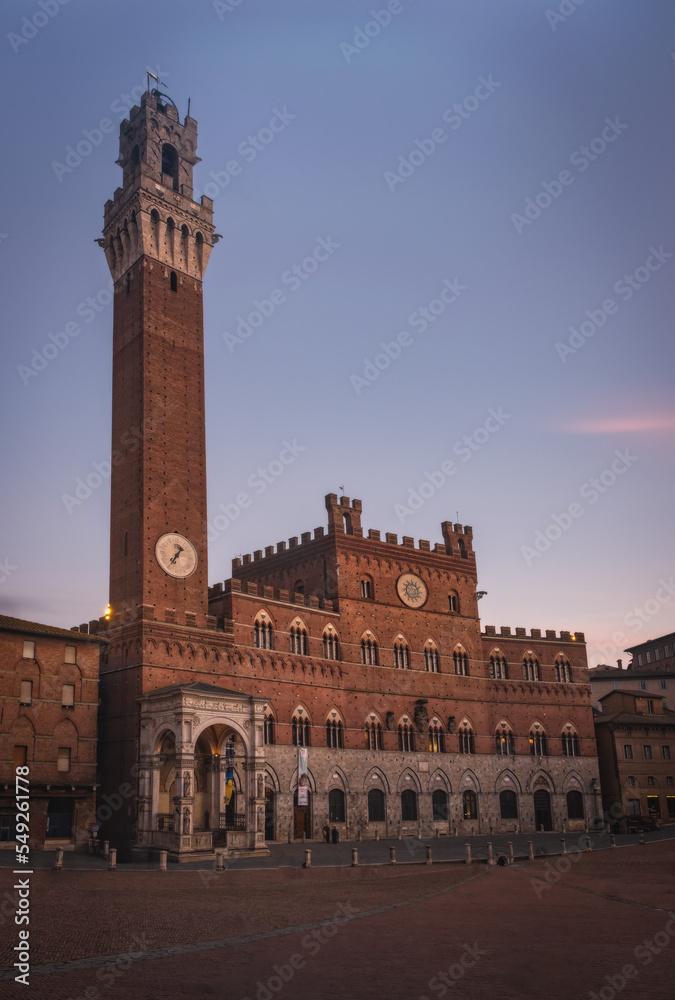 Campo Square or Piazza del Campo, Palazzo Pubblico and Mangia Tower or Torre del Mangia in Siena, Province of Siena, Tuscany, Italy. Architecture and landmarks of Siena. Sunset time, September 2022