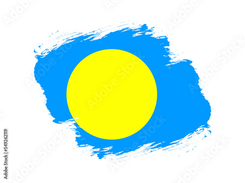 Stroke brush textured flag of palau on white background photo