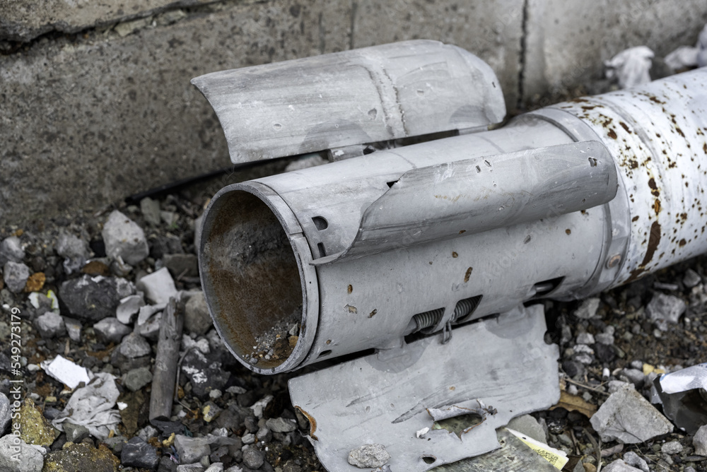 weapon rocket lying on the ground near the wall in Ukraine weapon rocket lying on the ground near the wall in Ukraine