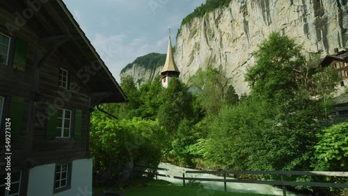 Church on the Weisse Lutschine river bank, Lauterbrunnen, Switzerland photo