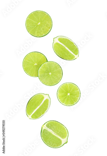 Falling of fresh lime fruit slices isolated on white background.