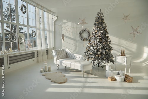 Beautiful Christmas tree in decorated living room. Festive interior