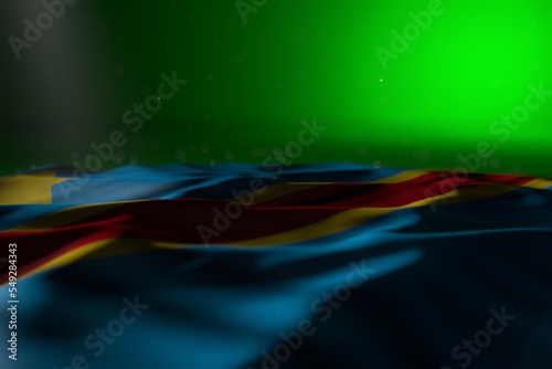 pretty dark picture of Democratic Republic of Congo flag lying on green background with bokeh and free space for your content - any holiday flag 3d illustration..