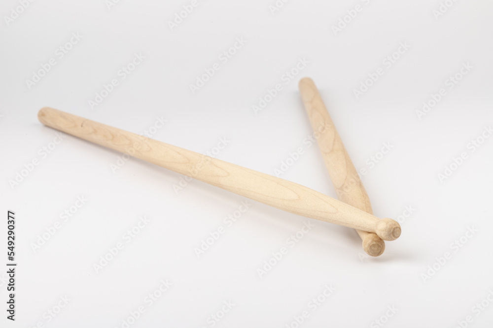 Wooden drumsticks isolated on white background. musical instrument. Wooden drumsticks isolated on white background. musical instrument.