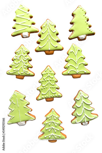 Homemade gingersnap covered with icing, delicious cookie with Christmas tree shaped photo
