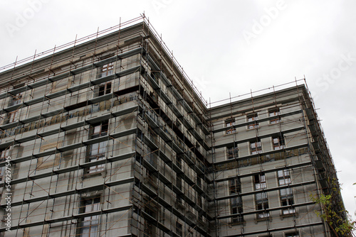 building under construction with scaffold 