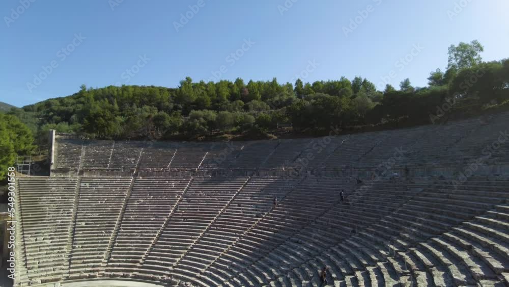 Walking around the amphitheater Kinortio Oros, Epidavros in Greece on a sunny morning. Walking around the amphitheater Kinortio Oros, Epidavros in Greece on a sunny morning.