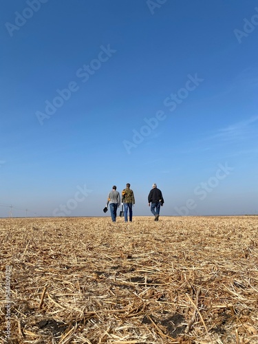 Workers walking in the field, agricultural 