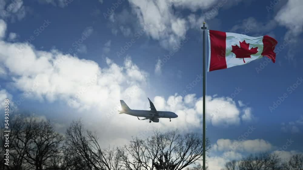Generic airplane landing in Canada. A passenger plane lowering its landing gears as it approaches a Canadian airport