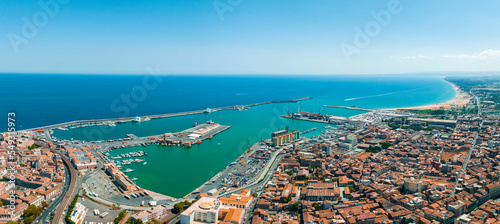 Fototapeta Naklejka Na Ścianę i Meble -  Aerial view on via Etnea in Catania. Dome of Catania and the main street with the background of volcano Etna, Sicily, Italy. Catania the UNESCO World Heritage.