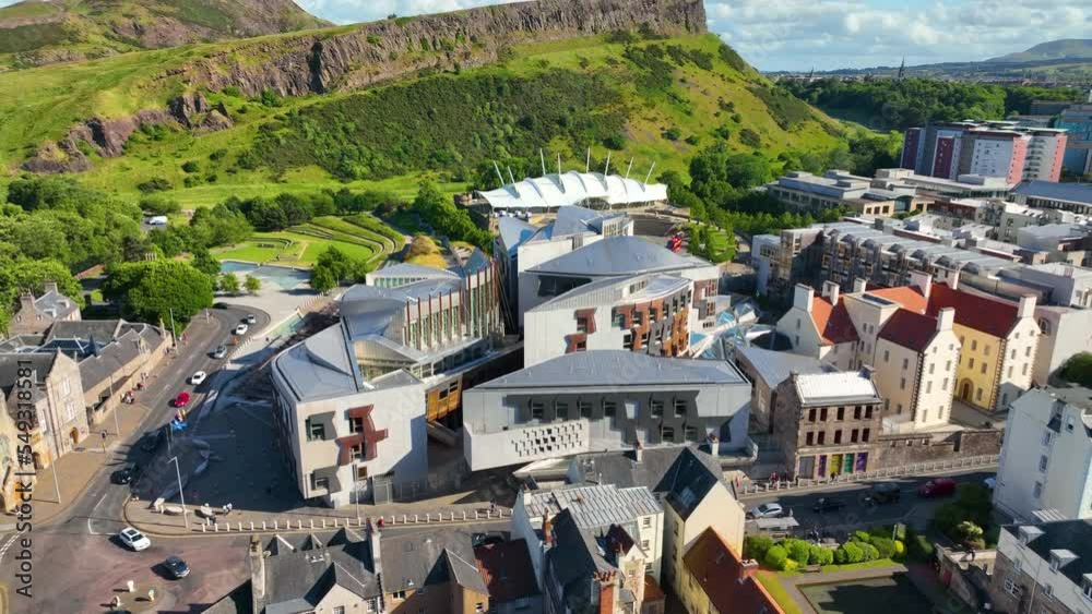 Scottish Parliament Building and Our Dynamic Earth aerial view on Royal Mile in Old Town Edinburgh, Scotland, UK. Old Town Edinburgh is a UNESCO World Heritage Site since 1995. Scottish Parliament Building and Our Dynamic Earth aerial view on Royal Mile in Old Town Edinburgh, Scotland, UK. Old Town Edinburgh is a UNESCO World Heritage Site since 1995.