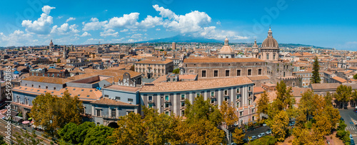 Aerial view on via Etnea in Catania. Dome of Catania and the main street with the background of volcano Etna, Sicily, Italy. Catania the UNESCO World Heritage. photo