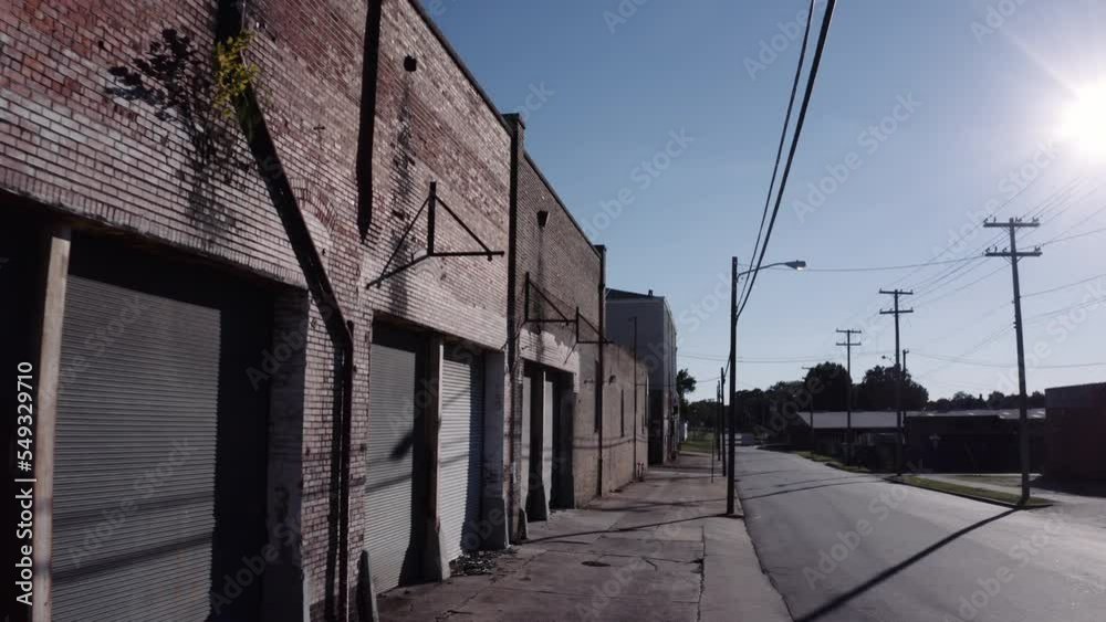 Empty sidewalk warehouse district in Wilson, NC Empty sidewalk warehouse district in Wilson, NC