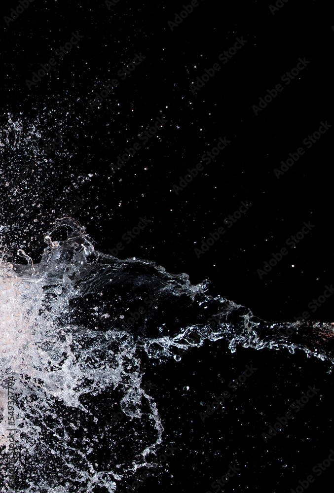 Shape form droplet of Water splashes into drop water attack fluttering in air and stop motion freeze shot. Splash Water for texture graphic resource elements, black background isolated Shape form droplet of Water splashes into drop water attack fluttering in air and stop motion freeze shot. Splash Water for texture graphic resource elements, black background isolated