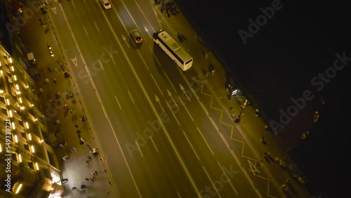 Aerial view of the bright gold Nevski street and Kazan Cathedral and House of the Singer company in the historical and at same time modern St. Petersburg at night