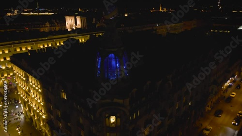 Aerial view of the Nevski street and Kazan Cathedral and House of the Singer company in the historical and at same time modern city of St. Petersburg at night