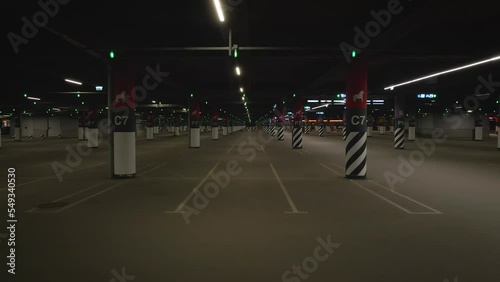 View from drone of the biggest underground parking shopping mall in night summer day, St. Petersburg