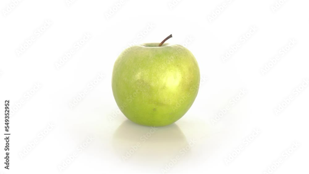 Green Apple spinning isolated on white background Green Apple spinning isolated on white background