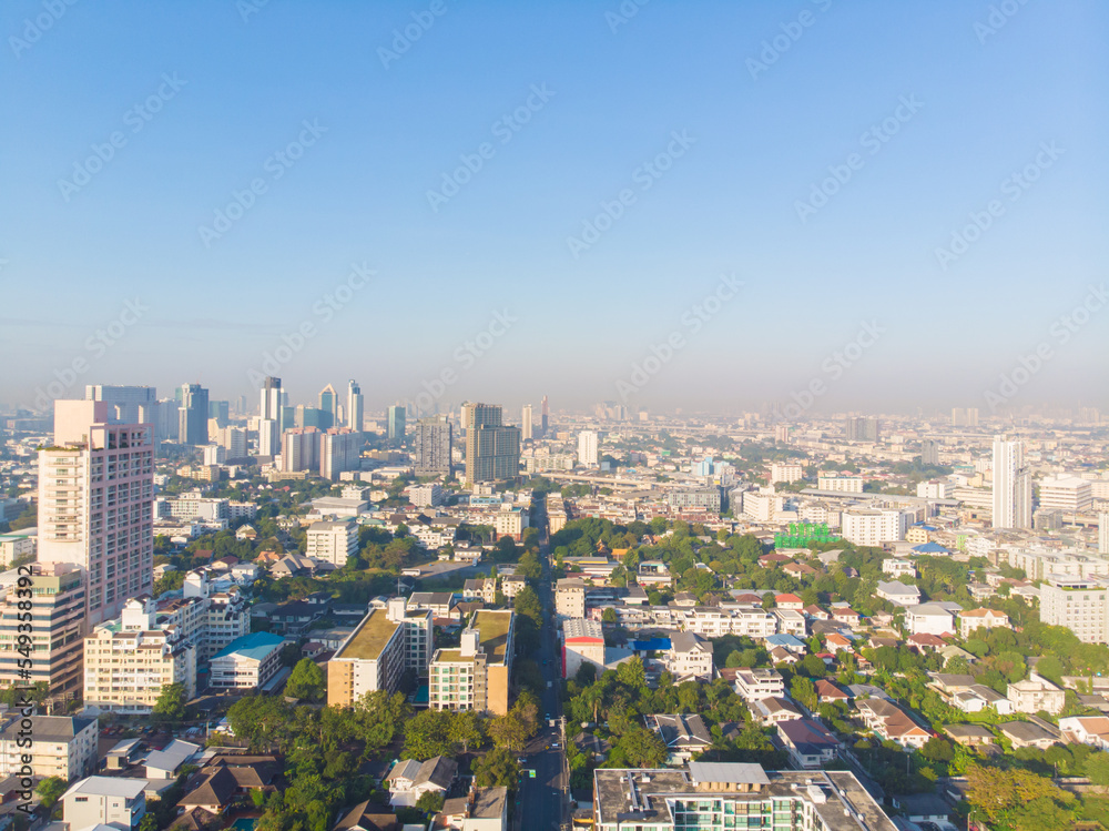 Fototapeta premium Aerial view metropolitan city office building morning sky