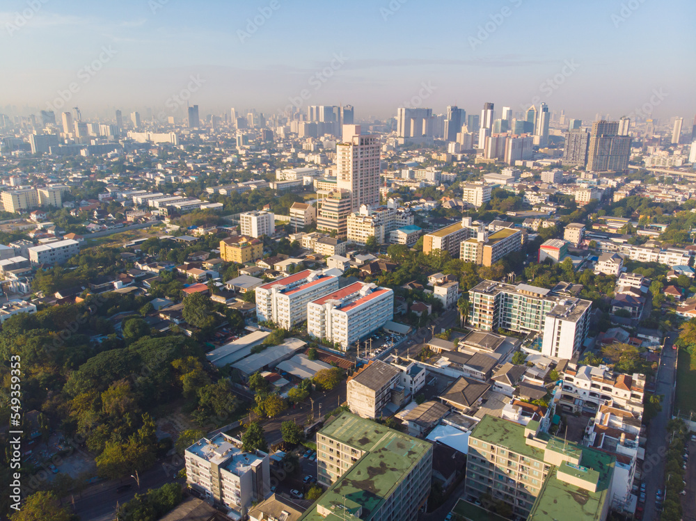 Fototapeta premium Aerial view metropolitan city office building morning sky