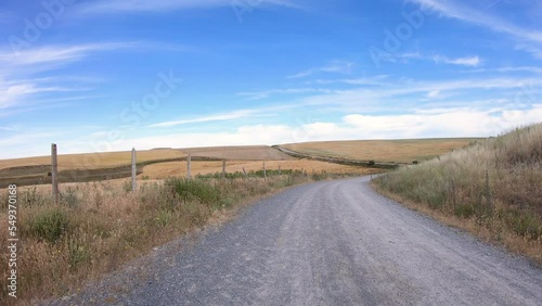 Camino de Madrid - gravel road on a summer landscape after Zamarramala, municipality of Segovia, Castile and León, Spain photo