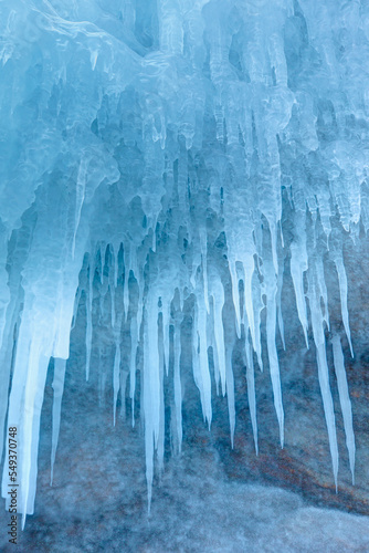 Inside the ice cave - ice cave winter frozen nature background landscape - Lake Baikal, Siberia, Eastern Russia © muratart