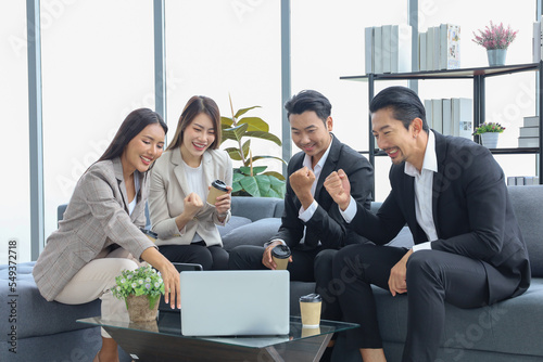 Business people relax meeting in office by using laptop computer and discussion or brainstorming