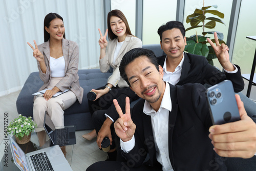 Business people relax meeting in office and selfie picture with team
