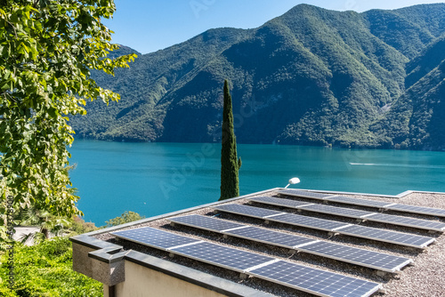 Solar panels on top of a roof of a Lugano home